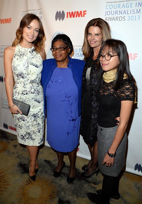 Olivia Wilde Pictures Olivia Wilde debuts her small baby bump while attending the 2013 International Women’s Media Foundation’s Courage in Journalism Awards at the Beverly Hills Hotel on Tuesday (October 29, 2013) in Beverly Hills, Calif.