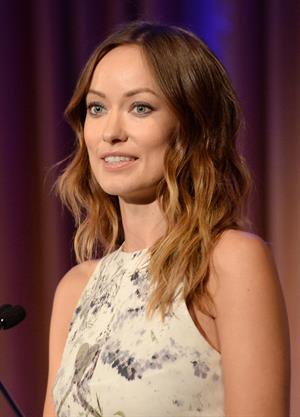 Olivia Wilde debuts her small baby bump while attending the 2013 International Women’s Media Foundation’s Courage in Journalism Awards at the Beverly Hills Hotel on Tuesday (October 29, 2013) in Beverly Hills, Calif.