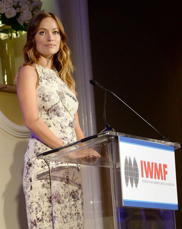 Olivia Wilde debuts her small baby bump while attending the 2013 International Women’s Media Foundation’s Courage in Journalism Awards at the Beverly Hills Hotel on Tuesday (October 29, 2013) in Beverly Hills, Calif.