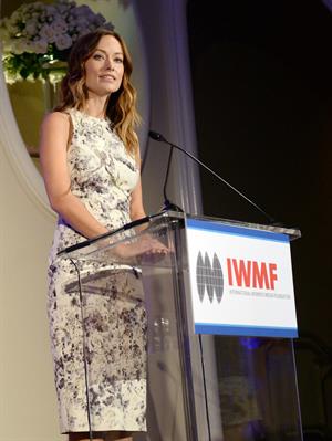 Olivia Wilde debuts her small baby bump while attending the 2013 International Women’s Media Foundation’s Courage in Journalism Awards at the Beverly Hills Hotel on Tuesday (October 29, 2013) in Beverly Hills, Calif.