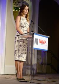 Olivia Wilde debuts her small baby bump while attending the 2013 International Women’s Media Foundation’s Courage in Journalism Awards at the Beverly Hills Hotel on Tuesday (October 29, 2013) in Beverly Hills, Calif.