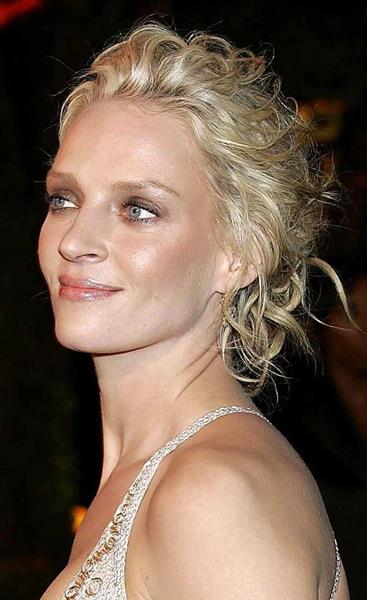 Uma Thurman in a white dress