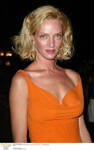 Uma Thurman in an orange dress