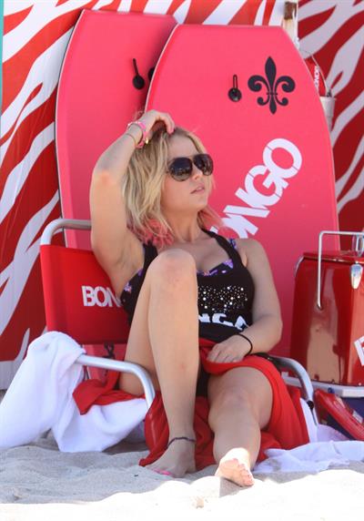 Lucy Hale and Ashley Benson photoshoot at the Bondo Bikini Shack on Miami Beach on March 24, 2012