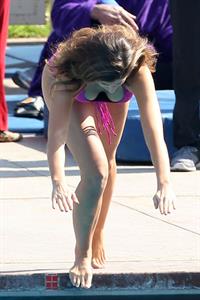 Katherine Webb, Miss Alabama USA 2012, in a pink swimsuit on the set for the TV show 'Celebrity Diving' in Los Angeles.