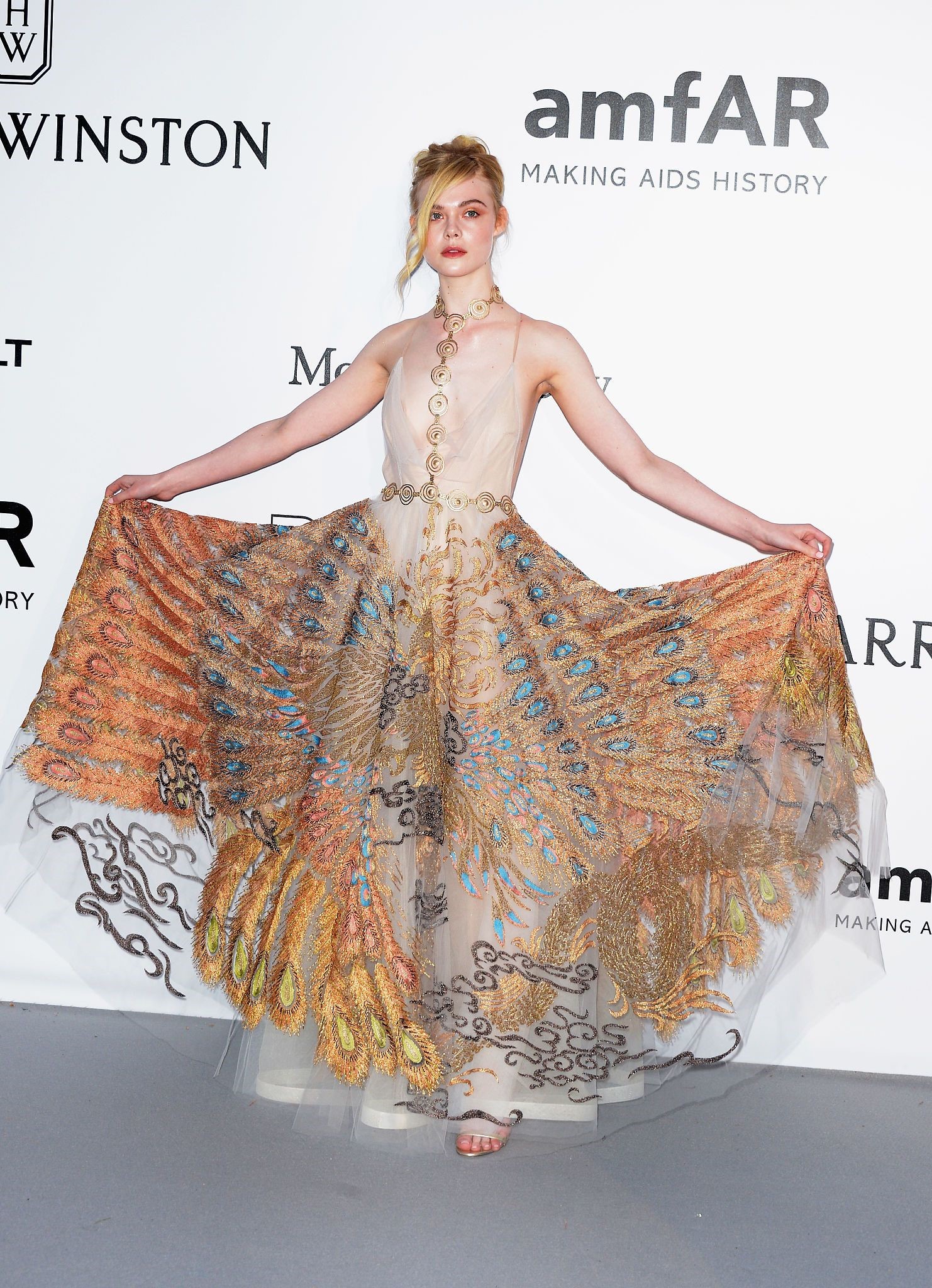 Elle Fanning showing off pasties at amfAR’s 23rd Cinema Against AIDS Gala