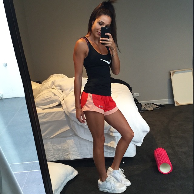 Kayla Itsines taking a selfie