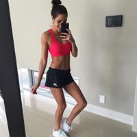 Kayla Itsines taking a selfie