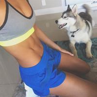 Kayla Itsines taking a selfie