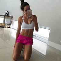 Kayla Itsines taking a selfie
