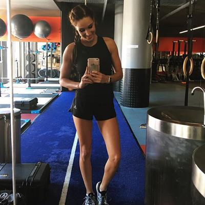 Kayla Itsines taking a selfie