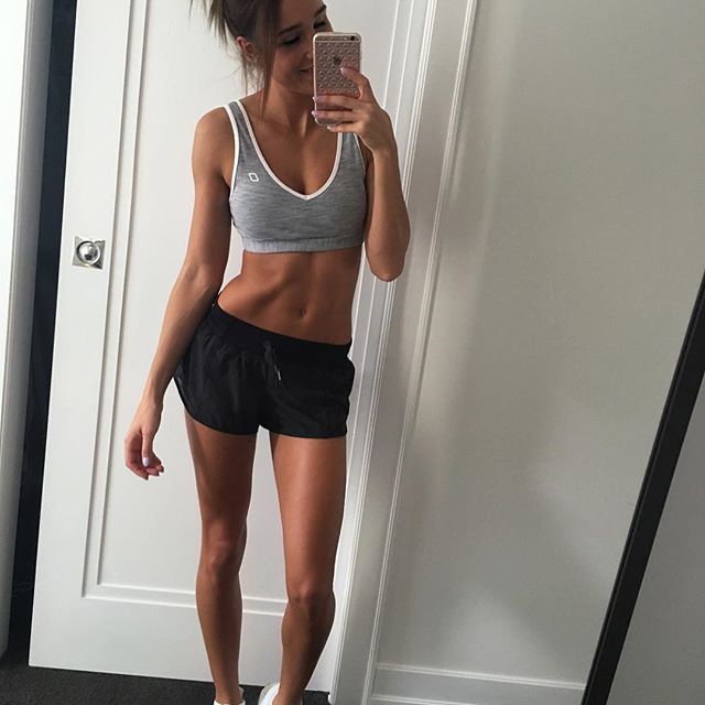 Kayla Itsines taking a selfie