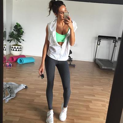 Kayla Itsines taking a selfie