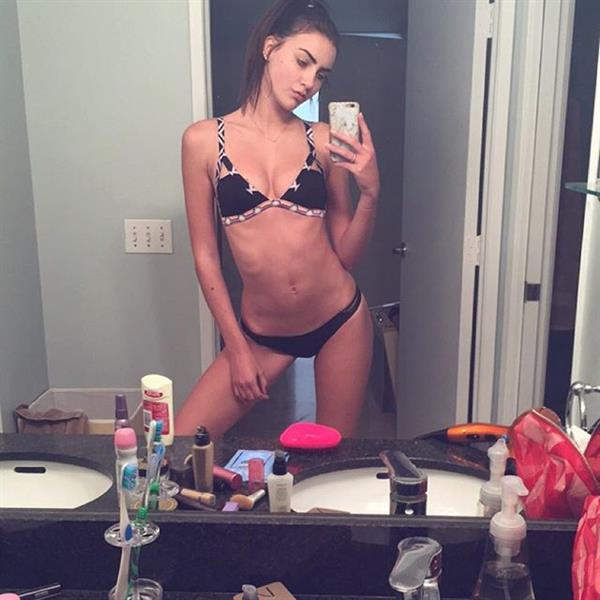 Anna Wolf in a bikini taking a selfie
