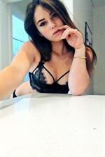 Alexis Young in lingerie taking a selfie