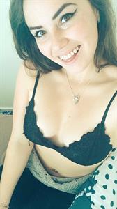 Alexis Young in lingerie taking a selfie