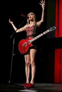 Taylor Swift on stage at the KIIS FM 2012 Jingle Ball concert at Nokia Theatre in Los Angeles - December 1, 2012 