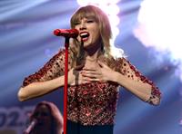 Taylor Swift on stage at the KIIS FM 2012 Jingle Ball concert at Nokia Theatre in Los Angeles - December 1, 2012 