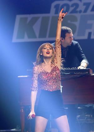 Taylor Swift on stage at the KIIS FM 2012 Jingle Ball concert at Nokia Theatre in Los Angeles - December 1, 2012 