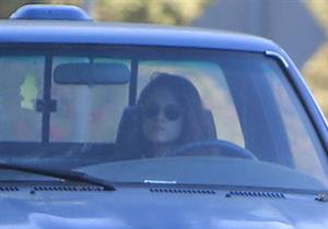 Kristen Stewart driving in Los Angeles - October 30, 2013  