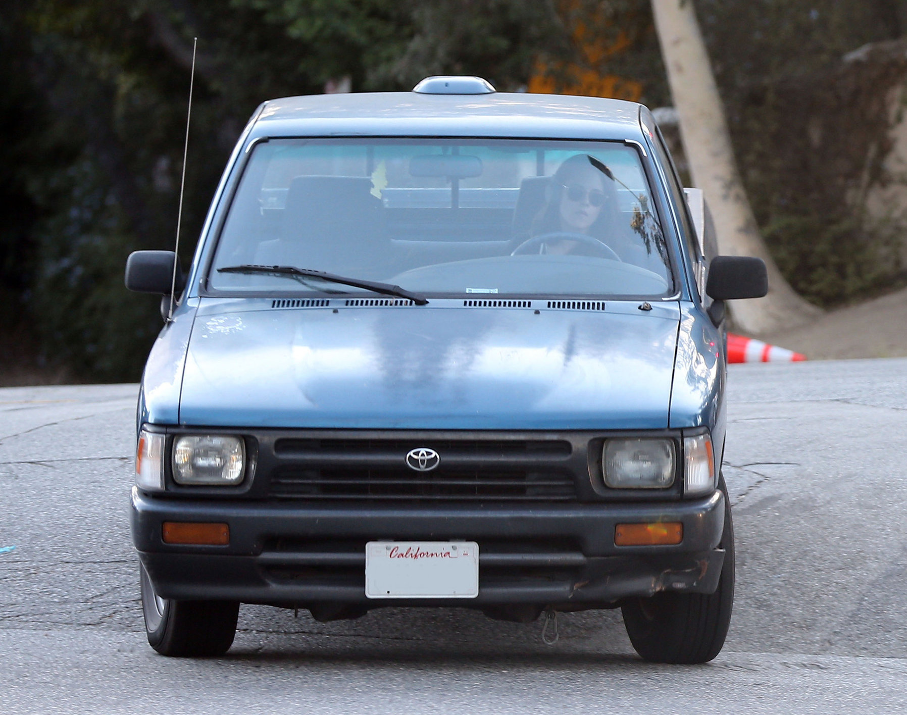 Kristen Stewart driving in Los Angeles - October 30, 2013  