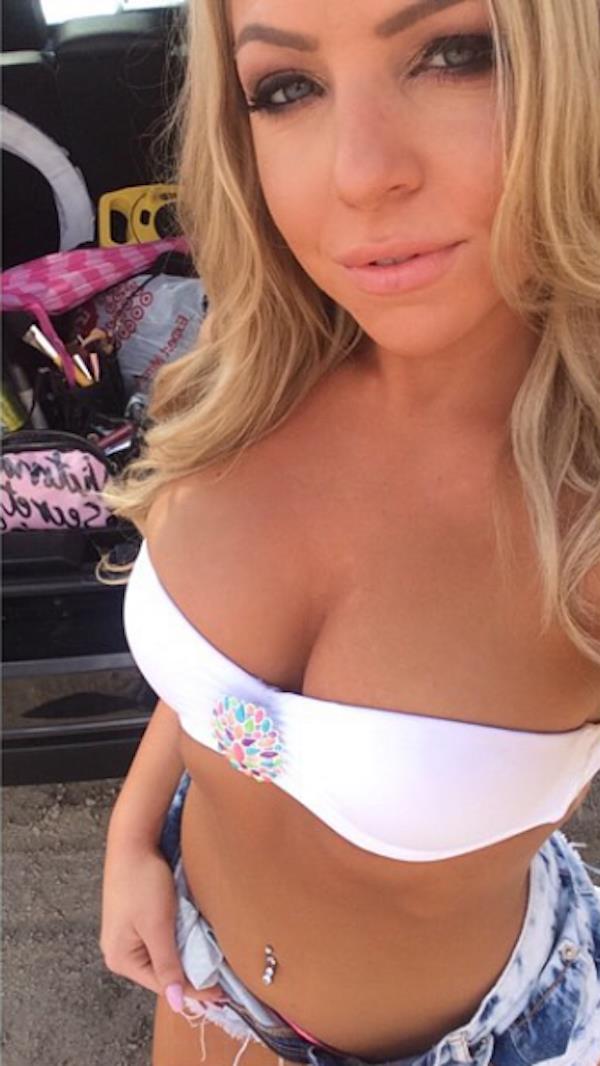 Teya Kaye in a bikini taking a selfie