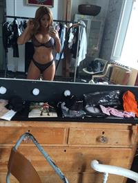 Holly Peers in lingerie taking a selfie