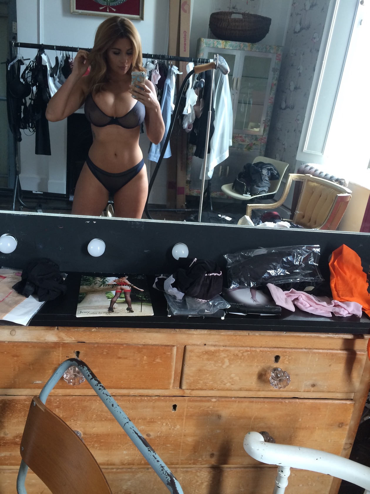 Holly Peers in lingerie taking a selfie