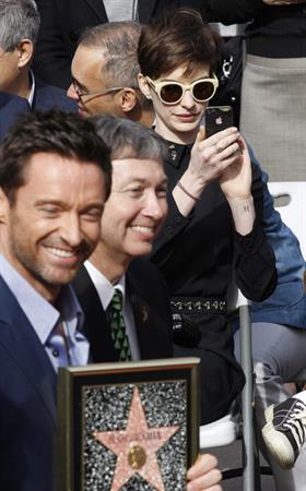 Anne Hathaway attends the Hugh Jackman Hollywood Walk Of Fame Ceremony in Hollywood December 13-2012 