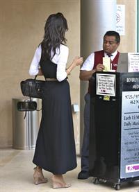 Zoe Saldana stops by an office building in Beverly Hills - January 14, 2012
