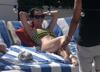 Katy Perry - In a bikini at a hotel pool in Miami July 27, 2012