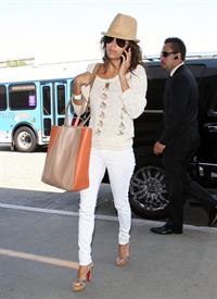 Eva Longoria - LAX airport to catch a flight out of town - August 10, 2012