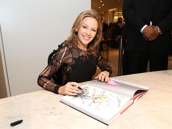 Kylie Minogue in a tight black mini dress for the launching of her book 'Kylie Fashion' at Saks Fifth Avenue