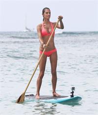 Alessandra Ambrosio paddleboarding in bikinis in Honolulu on October 12, 2011