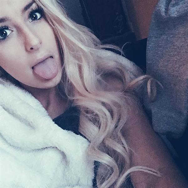 Tana Mongeau taking a selfie