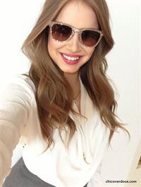 Xenia Tchoumitcheva taking a selfie