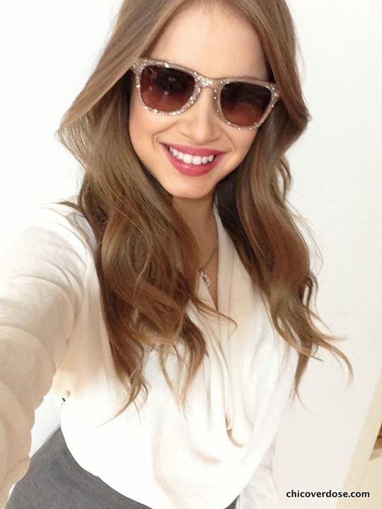 Xenia Tchoumitcheva taking a selfie