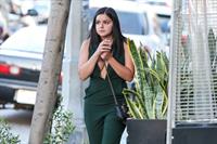 Ariel Winter shows cleavage while on a walk