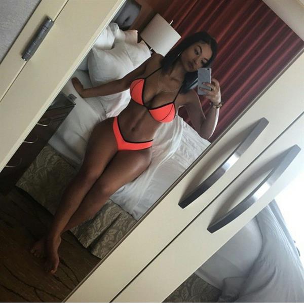 India Westbrooks in a bikini taking a selfie