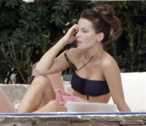 Kate Beckinsale in bikini as she fits in some sunbathing on family holiday in Mexico March 28-2013 
