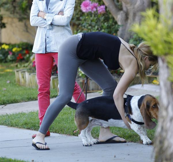 Jennifer Lawrence in Santa Monica helping a woman who fainted on June 25, 2012 