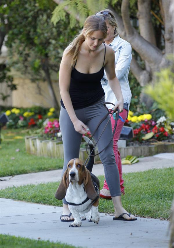 Jennifer Lawrence in Santa Monica helping a woman who fainted on June 25, 2012 