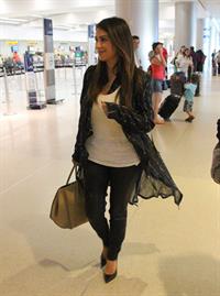 Kim Kardashian catches a flight out of Miami October 4, 2012 