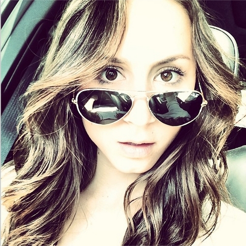 Troian Bellisario taking a selfie