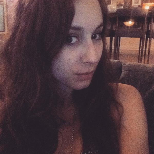 Troian Bellisario taking a selfie