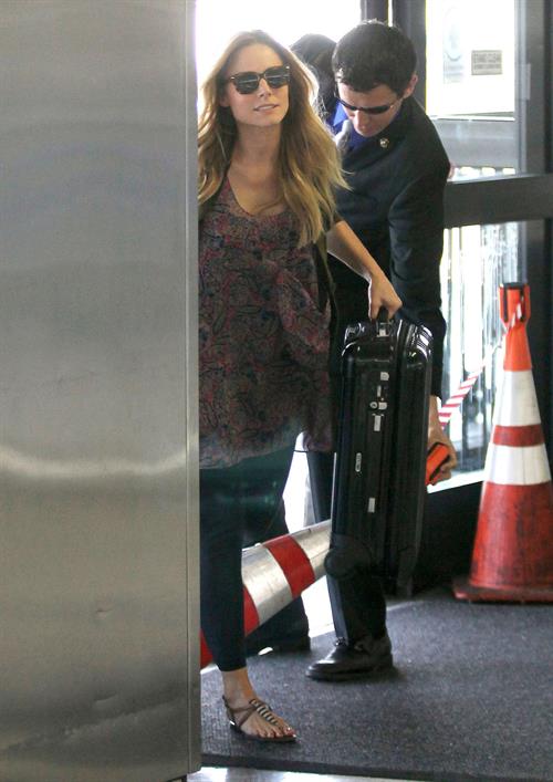 Kristen Bell - Departing on a flight at LAX - August 21, 2012