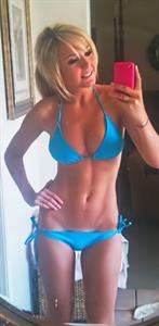 Jessica Nigri in a bikini taking a selfie