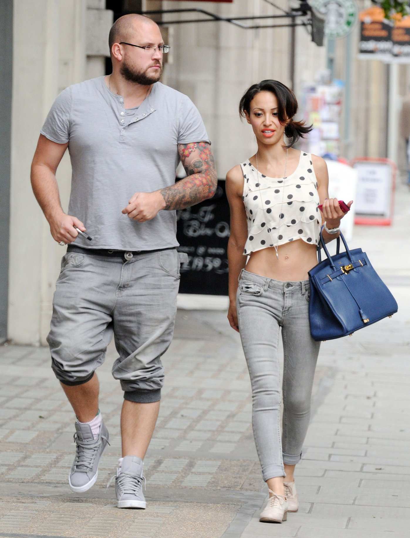 Amelle Berrabah walking in London on July 5, 2011