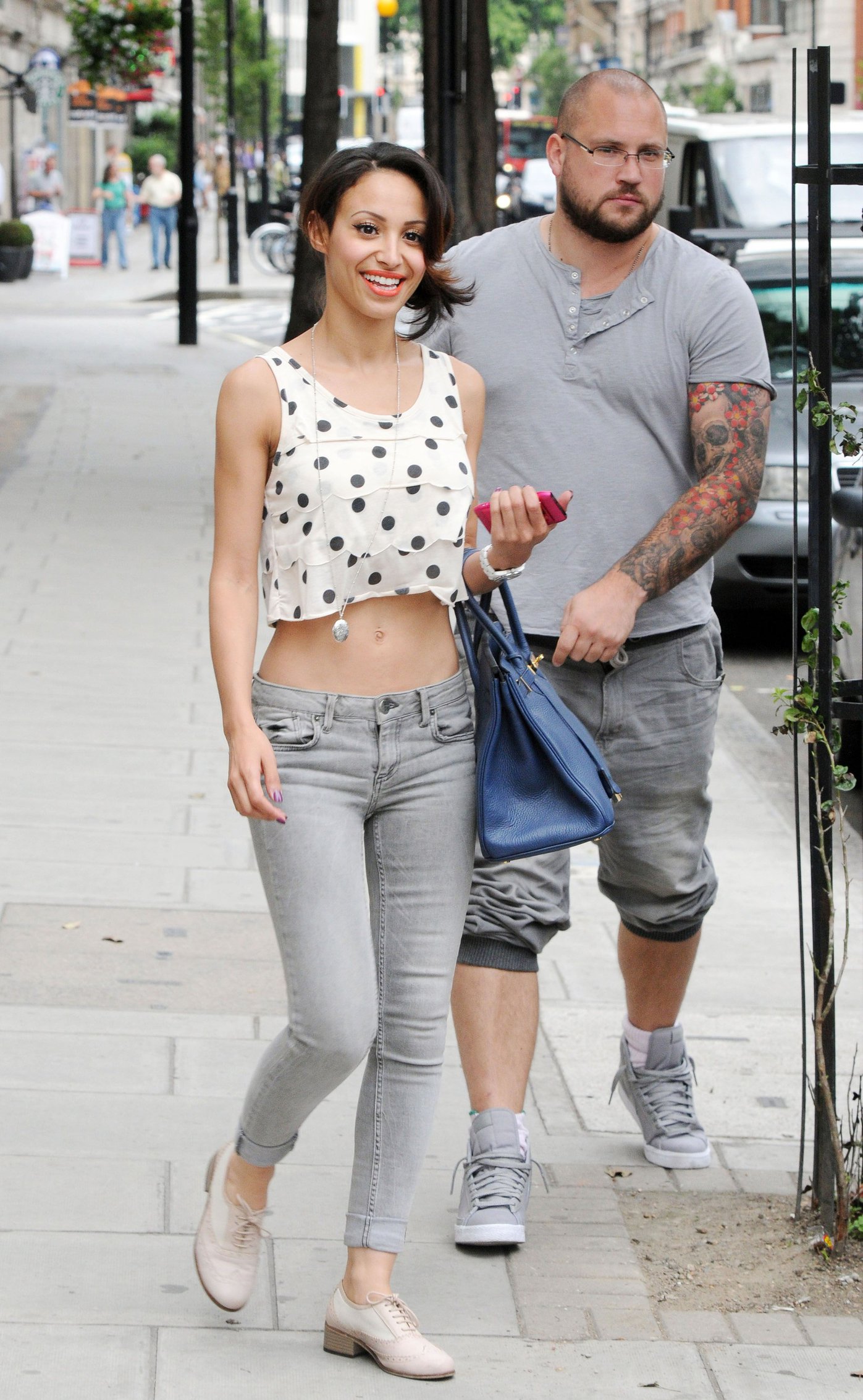 Amelle Berrabah walking in London on July 5, 2011