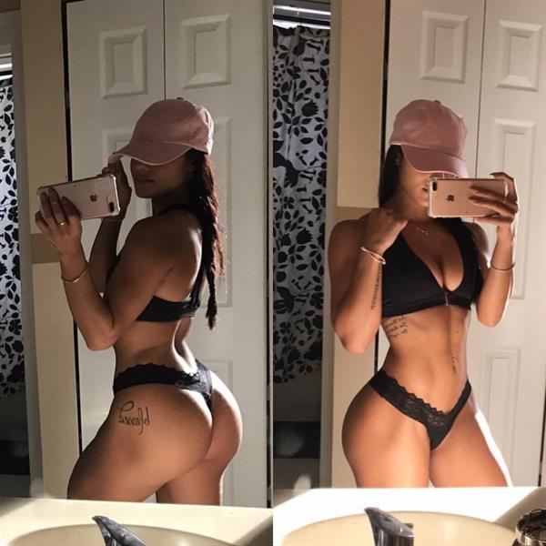 Katya Elise Henry taking a selfie and - ass